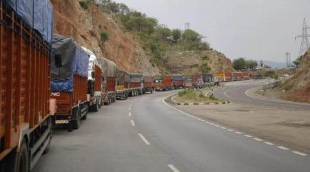 Jammu: Trucks stranded on Jammu and Srinagar highway which was closed due to heavy landslides in Ramban area, in Jammu district, Saturday, May 11, 2019. (PTI Photo)