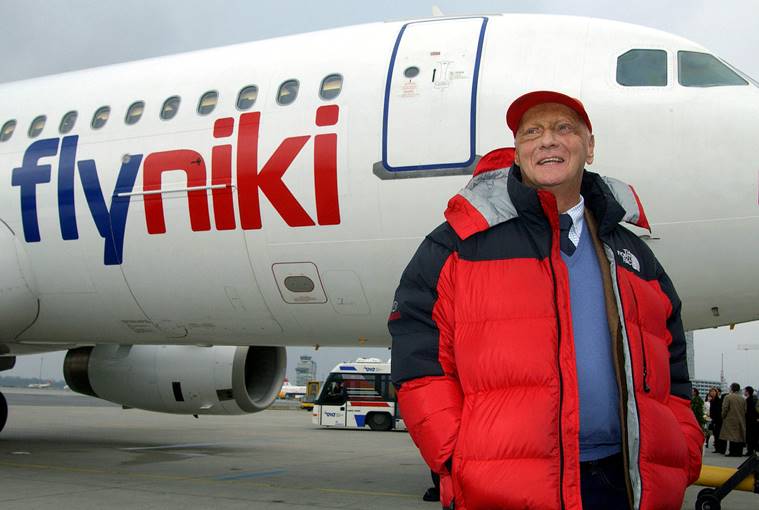 Former Formula One World Champion Niki Lauda poses for photographers in front of an airbus A320 at Vienna's Airport, Austria