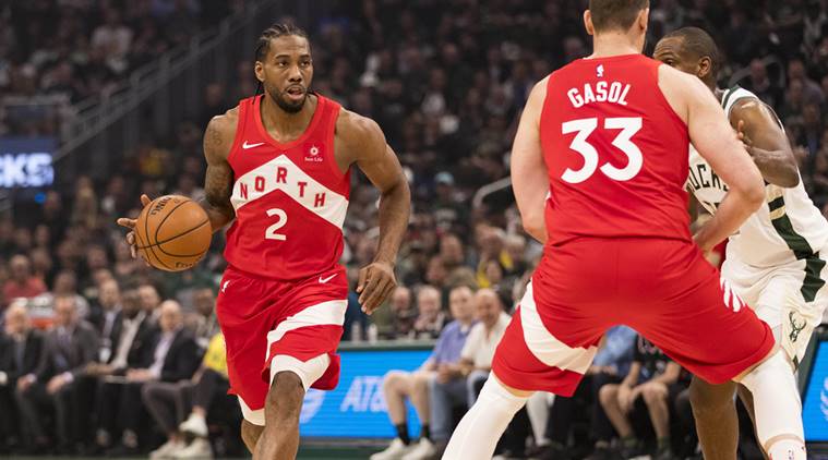 Toronto Raptors forward Kawhi Leonard (2) dribbles the ball during the first quarter against the Toronto Raptors in game five of the Eastern conference finals of the 2019 NBA Playoffs at Fiserv Forum
