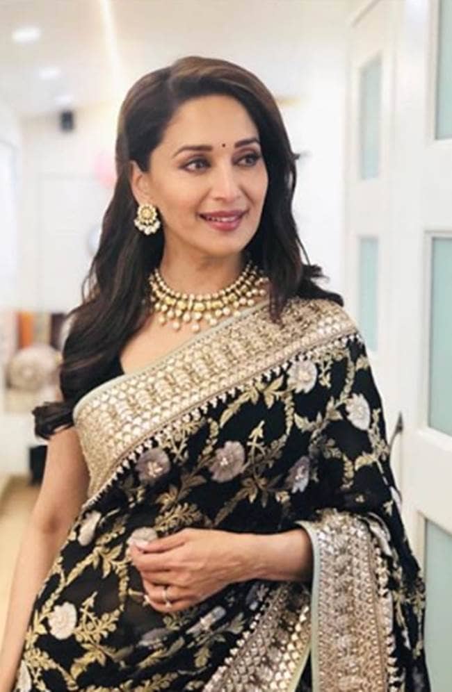 Madhuri Dixit, Madhuri Dixit birthday looks, Madhuri Dixit latest photos, Madhuri Dixit fashion, Madhuri Dixit smile, Madhuri Dixit saris, Madhuri Dixit ethnic saris, indian express, indian express news