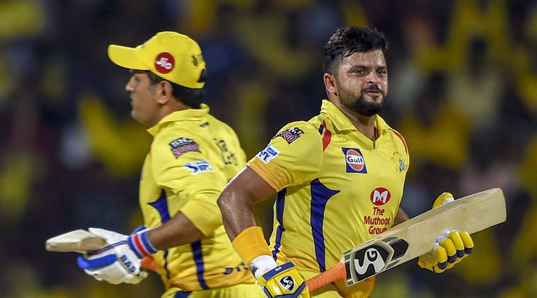 Chennai Super Kings skipper MS Dhoni and Suresh Raina take runs during the Indian Premier League 2019 cricket match against Delhi Capitals at MAC Stadium in Chennai