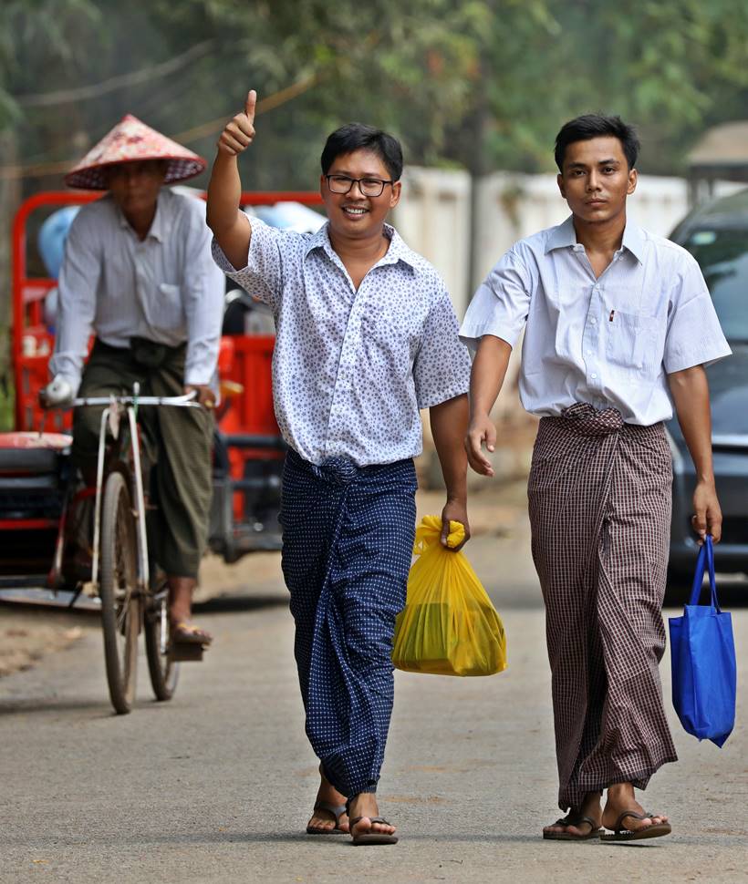 reuters journalists, reuters journalists rohingya, reuters journalist freed, reuters journalist photos, myanmar jail reuters journalists, WA LONE, KYAW SOE OO, reuters report rohingya, world news, indian express