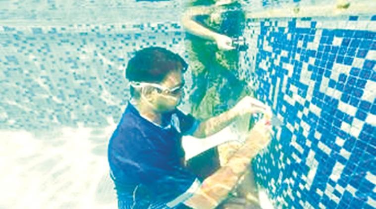 Malad youth solves nine Rubik’s cubes underwater, creates Guinness record
