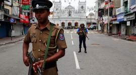 Security personnel stand guard in front of St Anthony’s Shrine in Colombo Sri Lanka, Sri Lanka visa, foreigners in Sri Lanka, Sri Lankan govt, Sri Lankan attacks, Sri Lanka bomb blasts, ISIS attacks, Sri lanka PM, Ranil Wickremesinghe Sri Lanka, Sri Lankan immigration laws, Sri Lanka suicide bombings, Sri Lanka terror attack, Sri Lanka church blasts, Indian Express
