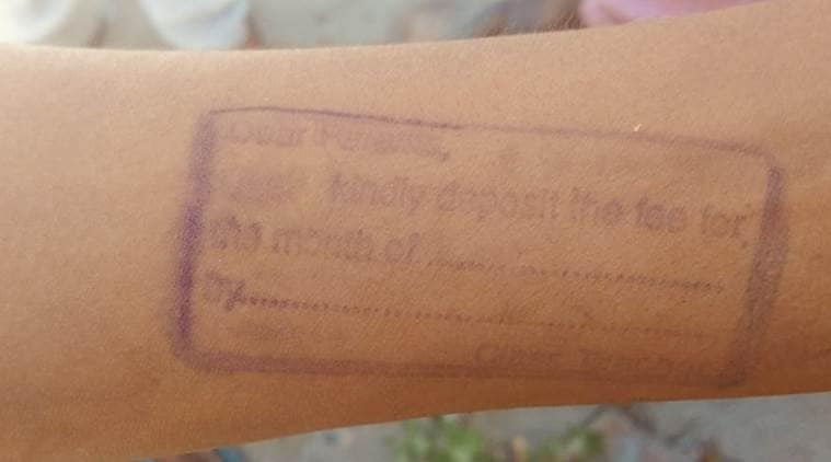 reminder fee stamp on the student hand, reminder fee stamp on the hand of the child, 5748962, kalan mundian, ludhiana, ludhiana news, news of education