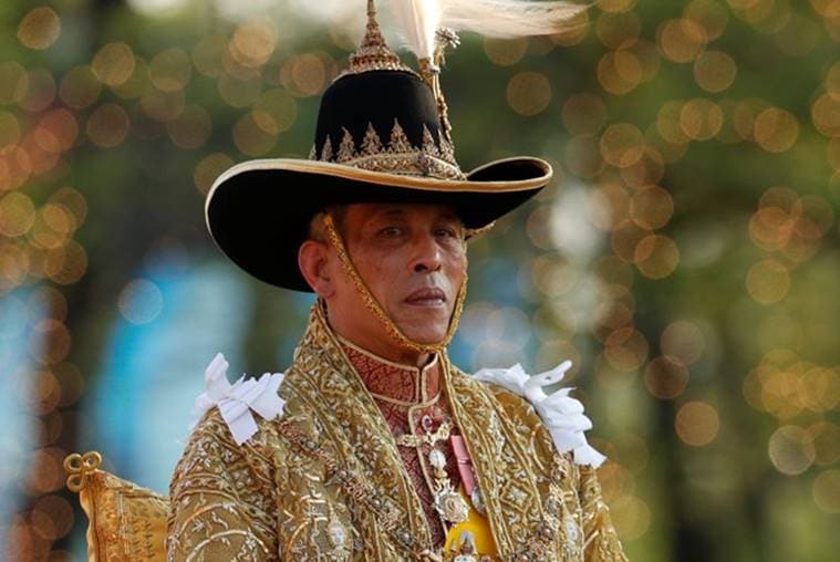 Newly crowned Thai king carried through Bangkok in royal procession