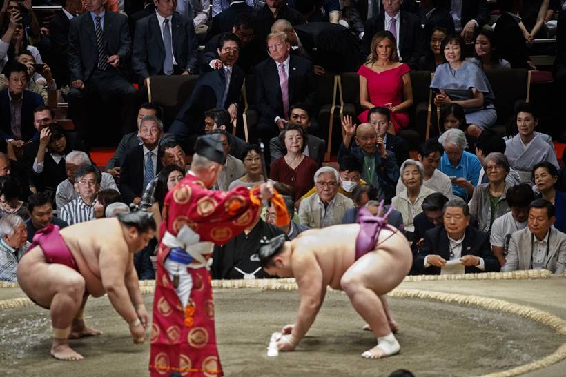 donald trump in japan, trump attends sumo summit photos, trump in japan photos, shinzo abe, japan pm, melania trump, sumo wrestling, world news, indian express