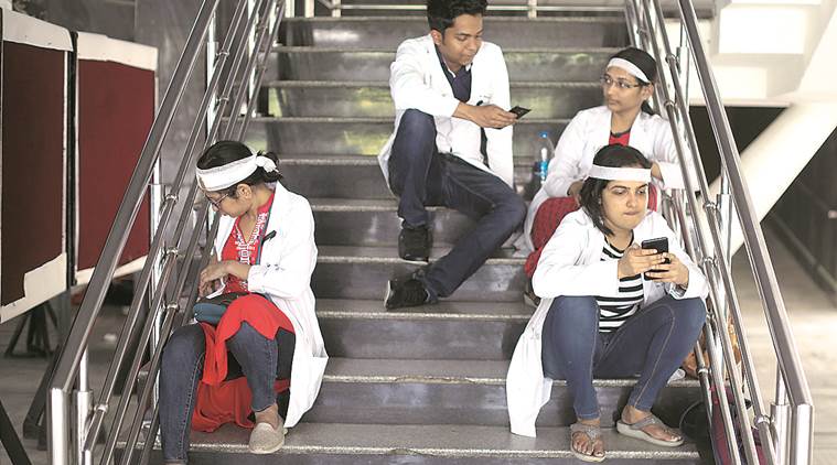 Delhi, Delhi News, doctors strike, aiims, aiims strike, aiims doctors strike, mamata banerjee, mamata doctors protest, bengal doctors protest, doctors protest bengal, nrs hospital kolkata West Bengal, bengal hospital clashes, NRS hospital kolkata west bengal, bengal doctors strike, Nilratan Sircar Medical College kolkata, bjp bengal protests, tmc, trinamool congress, bjp in bengal, west bengal bjp, clashes in west bengal, bjp tmc clashes, west bengal government, india news, Indian Express