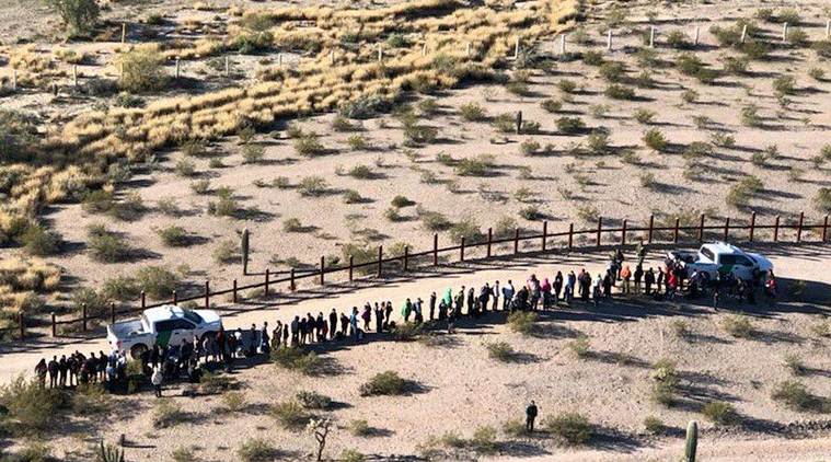 Seven migrant deaths reported in 'extreme heat' at US border