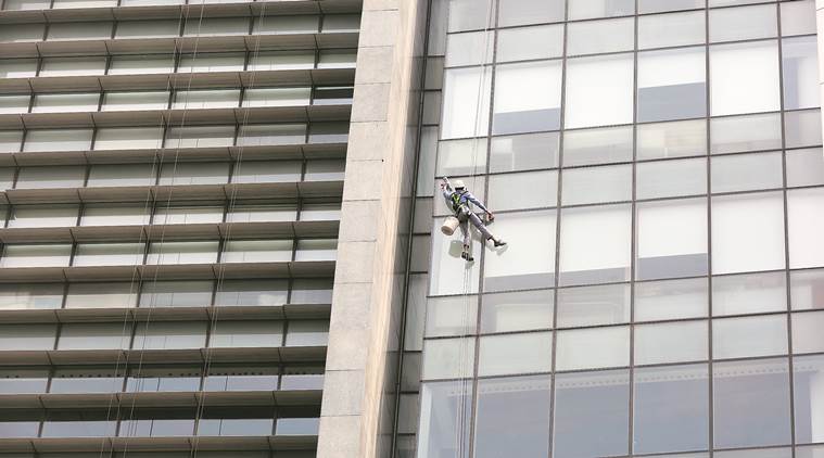 Building cleaners, facade cleaners, multi storey building, multi storey building cleaners, indian express