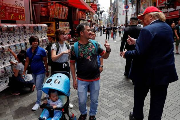 kim jong-un, donald trump, kim jong-un impersonator, donald trump impersonator, doppelganger, lookalike, us-north korea, osaka, g 20 summit, world news, indian express
