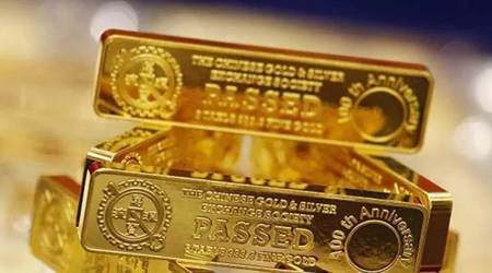 Gold falls 1% as nations plan to ease coronavirus lockdowns, US states with fewer cases ease restrictions, Bank of Japan expands monetary stimulus, Gold set to gain in the long term on safe-haven demand, global gold prices news, commodity market news, business news india, indian express business news