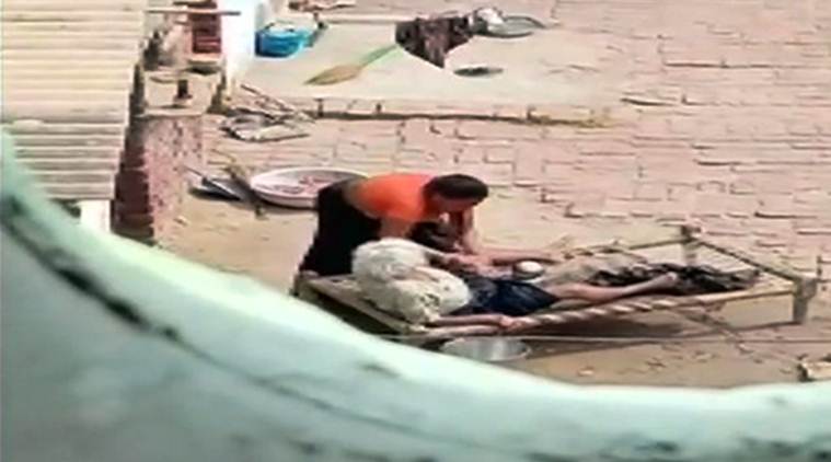 Haryana woman beaten, Haryana woman beaten video, manohar lal khattar,haryana woman arrested, haryana woman, haryana woman mother in law, woman thrashed mother in law, haryana woman video, haryana video, haryana woman viral video, chandigarh haryana, manohar lal khattar, khattar haryana, haryana, latest news, indian express news