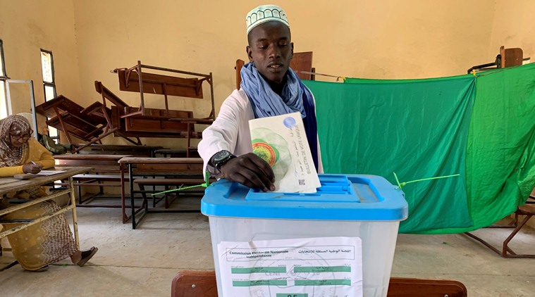 Mauritania votes as first peaceful transfer of power expected country with history of coups