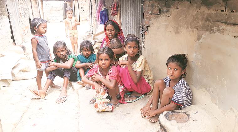 wall collapse death, ditch wall collapse, labourer, labourer children danger, dangers faced by labourers, noida wall collapse death, indian express