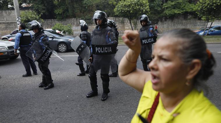 Honduras, Honduras police strike, Honduran police, Riot police, Riot police three-day strike, Riot police work stoppage, Riot police strike, Juan Orlando Hernandez, Juan Orlando Hernandez resignation, anti-Hernandez protesters, World news, Indian Express news
