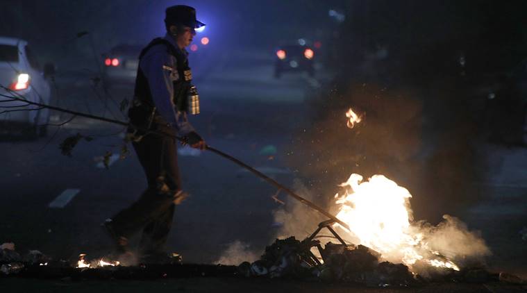 Honduras, Honduras police strike, Honduran police, Riot police, Riot police three-day strike, Riot police work stoppage, Riot police strike, Juan Orlando Hernandez, Juan Orlando Hernandez resignation, anti-Hernandez protesters, World news, Indian Express news
