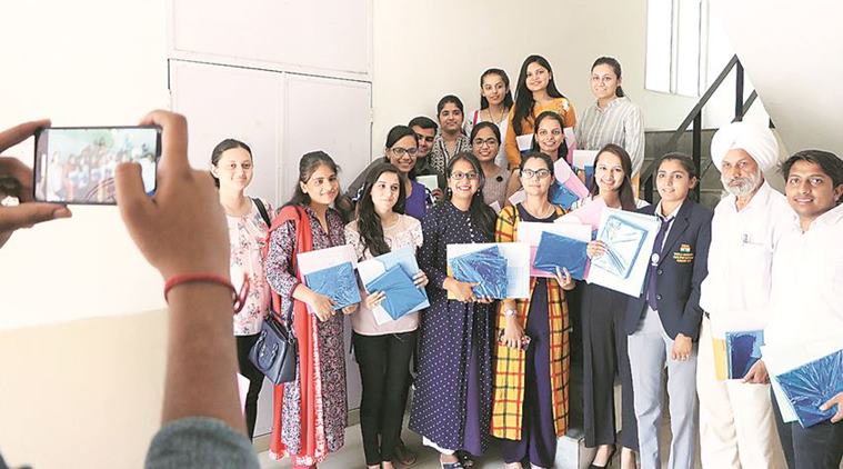 Panjab University alumni award scholarships to toppers