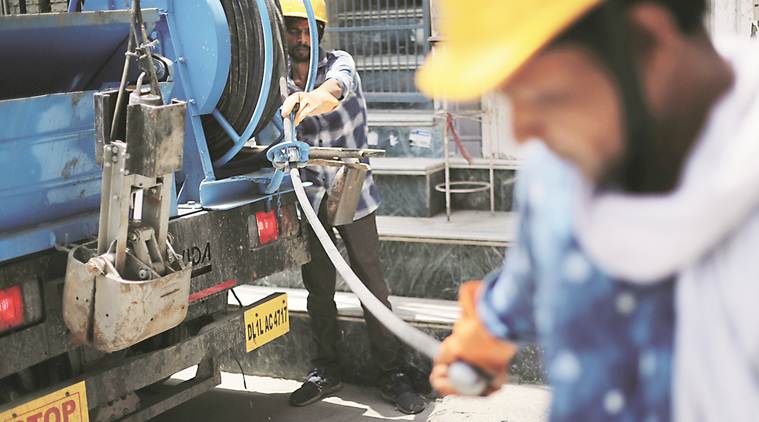 Delhi, Delhi news, Delhi sewage workers deaths, manual scavenging, Delhi sewage cleaning machines, delhi sewer cleaning machines, delhi sewer workers death, sewage machines delhi, delhi sewage machines, delhi sewer machines, AAP Delhi, Arvind Kejriwal, Delhi hardlook, indian express