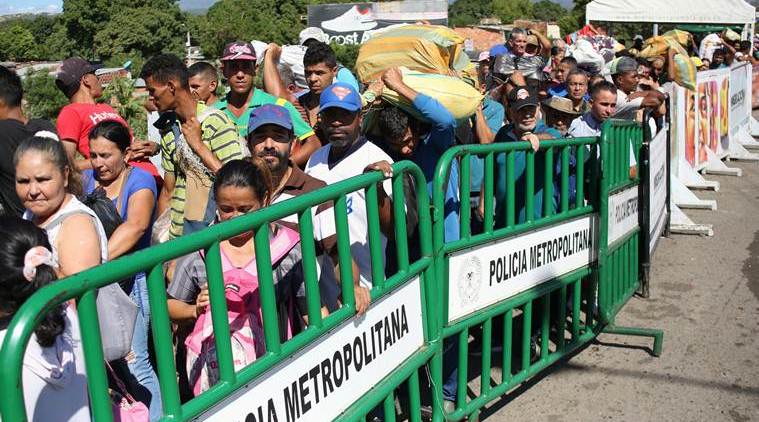 Thousands pour into Colombia as Venezuela reopens border
