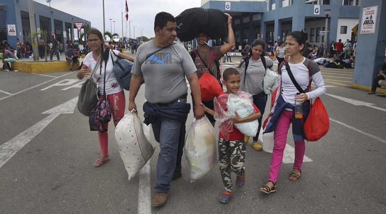 Chile offers 'democratic responsibility visa' to Venezuelan migrants