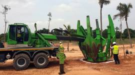 Volvo-Machine-dig-fresh-pit-tree-transplantation-Bengaluru-Bangalore-Airport