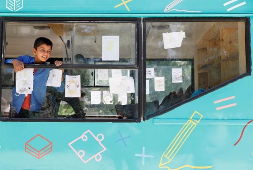 mobile library, mobile bus library, library in bus, kabul mobile bus library, afghanistan bus library, library-on-wheels, library-on-wheels kabul, library-on-wheels afghanistan, world news, indian express