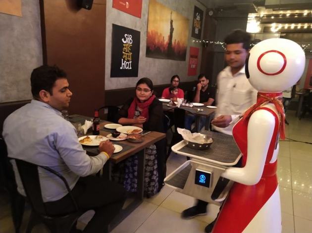 ahmedabad restaurant robots, robots as waiters, ahmedabad restaurant robots as waiters, ahmedabad robot restaurant photos, ahmedabad news, indian express