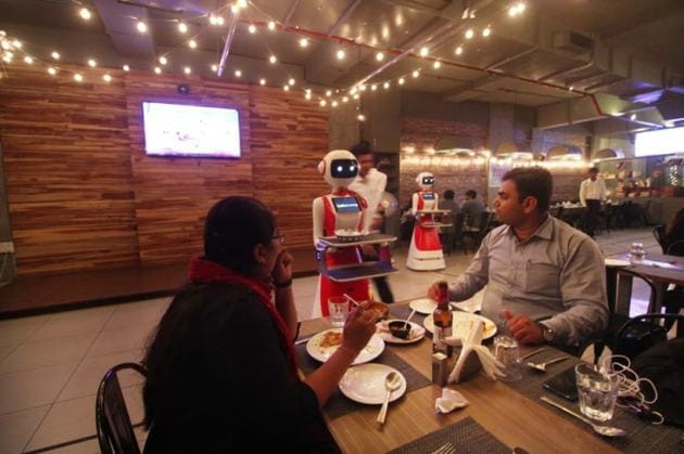 ahmedabad restaurant robots, robots as waiters, ahmedabad restaurant robots as waiters, ahmedabad robot restaurant photos, ahmedabad news, indian express
