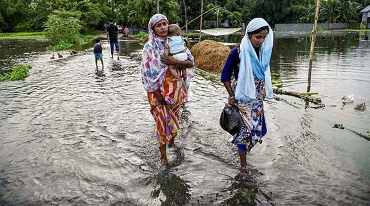 Assam floods, Assam flood deaths, Assam flood situation, Assam Chief minister, PM calls Assam chief minister, Assam flood news, Assam news, North East news, Indian Express news