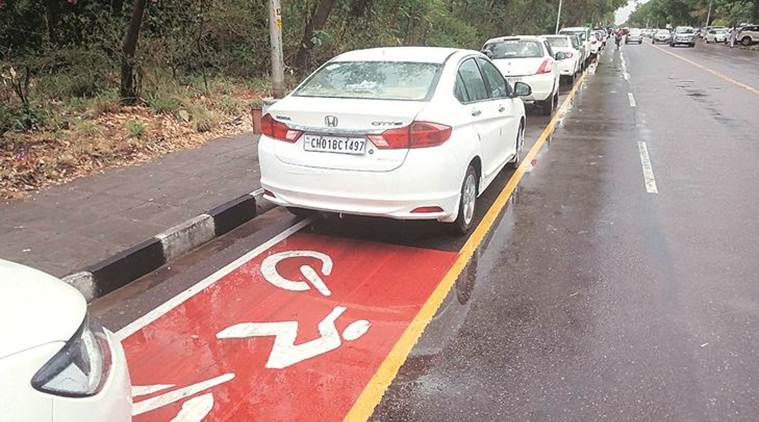 Chandigarh Vehicles parked on cycle track near High Court, bar body to
