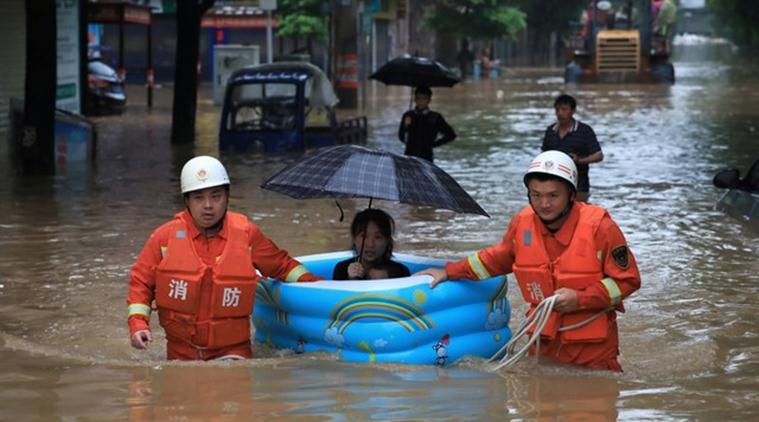 Heavy Rain, Floods In China Force Evacuation Of Nearly 80,000 | World ...