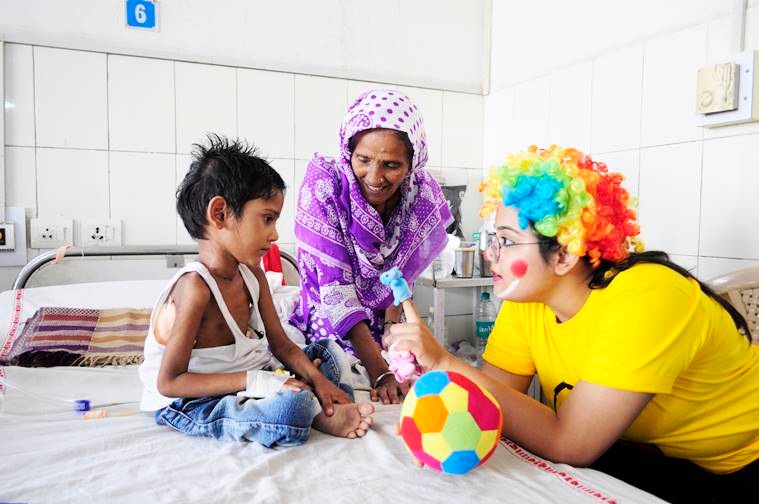 medical clowning, clowning therapy, clowning professionals, clowning in hospitals, indian express