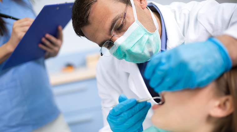 dentist, tooth decay, gum disease, oral health, indian express
