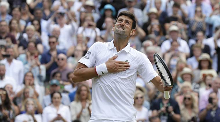 Novak Djokovic celebrates winning Wimbledon 2019