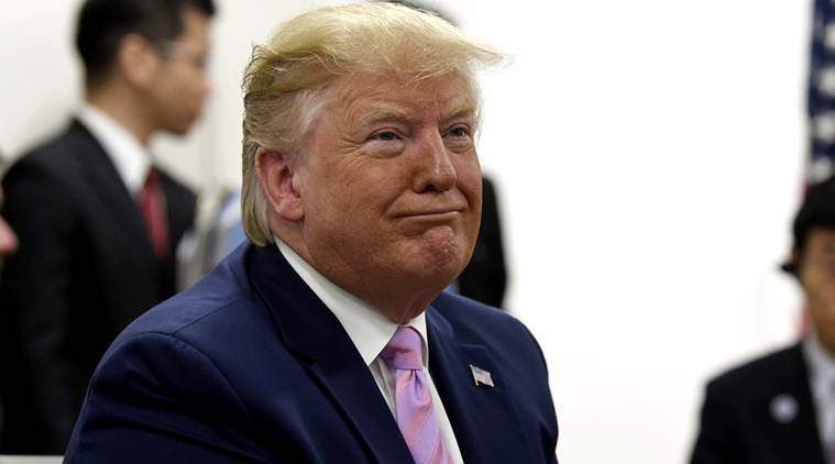 Trump warns Iran after Rouhani threat to enrich more uranium