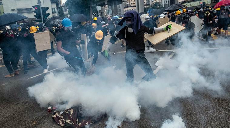 kong 2019 warning hong travel police tear by Kong gas hit thousands as Hong protest