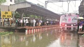 mumbai rains, mumbai monsoons, mumbai floods, mumbai waterlogging, mumbai railways, central railway timetable, mumbai local train time, mumbai news