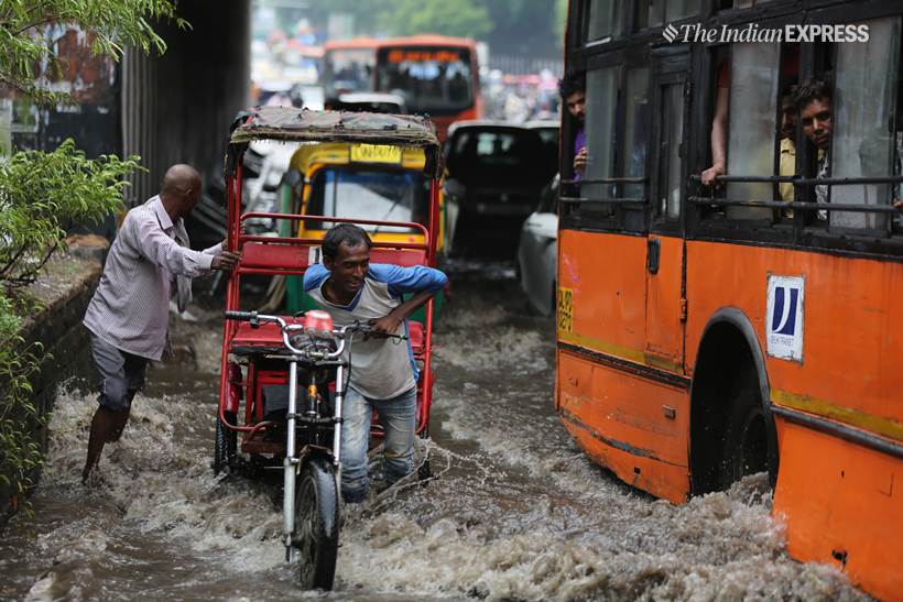 Delhi rains, delhi waterlogged, old delhi rains, raons in old delhi, waterlogged roads in old delhi, delhi weather, fdelhi weather forecast, delhi rain photos, delhi rain pics, delhi rain pictures, old delhi pictures, indian express