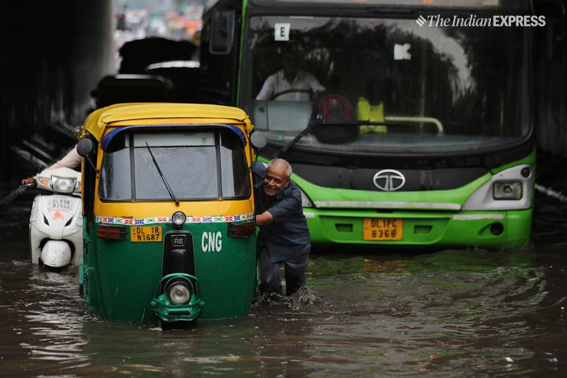 Delhi rains, delhi waterlogged, delhi rains photos, old delhi rains, raIns in old delhi, waterlogged roads in old delhi, delhi weather, delhi weather forecast, delhi rain photos, delhi rain pics, delhi rain pictures, old delhi pictures, indian express