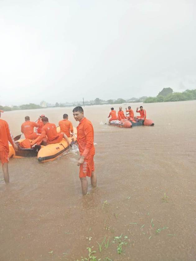mumbai rains photos, mumbai airport photos, Mumbai waterlogging photos, mumbai weather, mahalaxmi expressm mumbai weather photos,