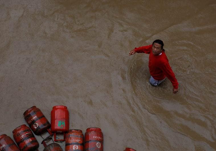 nepal rains, nepal floods, rains in nepal, nepal monsoon, nepal rain victims, nepal police, kathmandu rains, kathmandu floods, world news, Indian Express