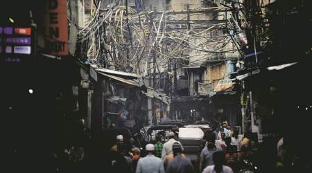 Olde delhi, overhead wires, old delhi hanging wires, old delhi loose wires, electrocution deaths, delhi electrocution deaths, electric wires, electric poles, old delhi overhead wires problem, indian express