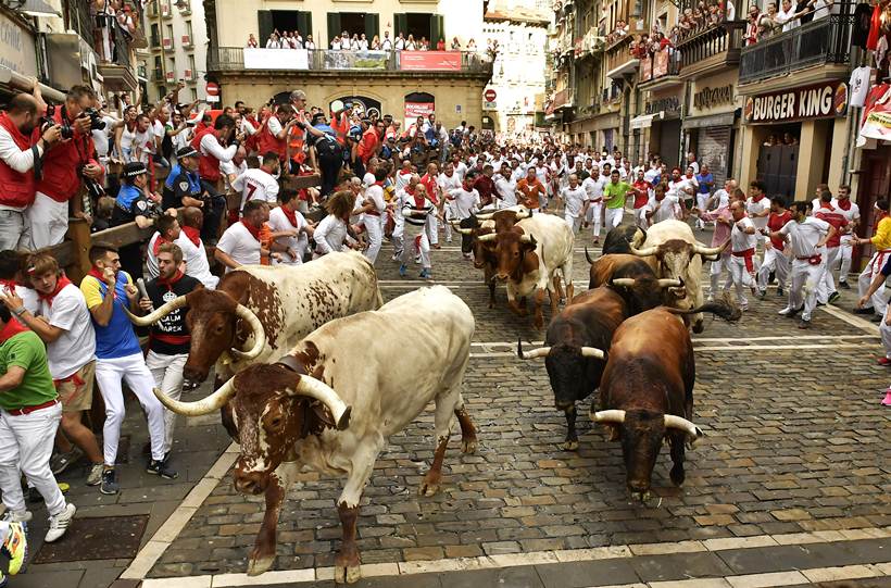 Pamplona bull-run festival kicks off with wine-soaked party