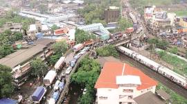 thane rain, rain in mumbai, ulhas river overflow, bridge washed away in rain, river dam breached, kalyan, waterlogging, ndrf rescue teams, maharashtra news, indian express news