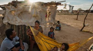 venezuela, venezuela crisis, venezuela political crisis, nicolas maduro, wayuu venezuela, columbia, latin america, america, us sanctions, hunger, hunger in venezuela, migrants, migration, medical treatment, diseases, refugees, world news, indian express news