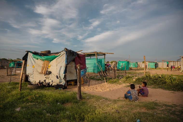 venezuela, venezuela crisis, venezuela political crisis, nicolas maduro, wayuu venezuela, columbia, latin america, america, us sanctions, hunger, hunger in venezuela, migrants, migration, medical treatment, diseases, refugees, world news, indian express news