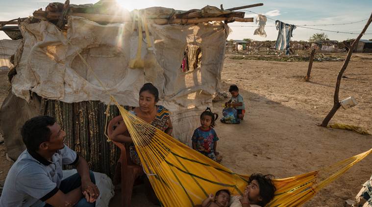 venezuela, venezuela crisis, venezuela political crisis, nicolas maduro, wayuu venezuela, columbia, latin america, america, us sanctions, hunger, hunger in venezuela, migrants, migration, medical treatment, diseases, refugees, world news, indian express news