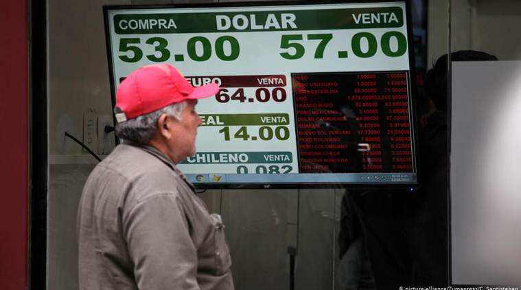 Argentina's peso, stock exchange plunge after President Mauricio Macri vote defeat