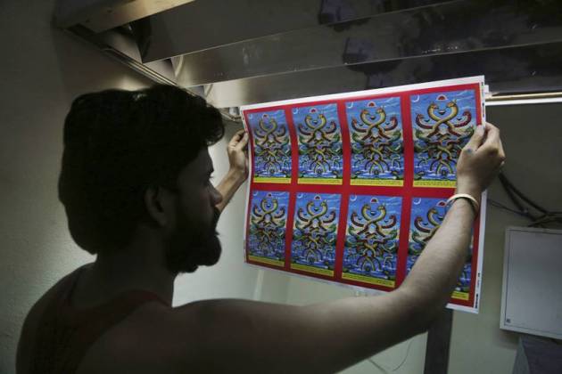 nepal chitrakaar families, nepal art, chitrakar couple, nepal chitrakar art, world news, indian express